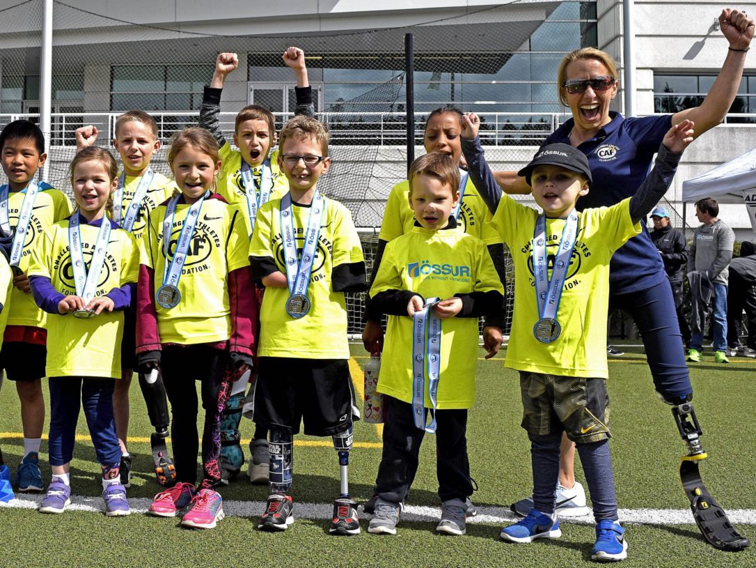 Help Me Raise Funds for Challenged Ahtletes - Kids and Sarah at CAF and Nike Mobility Clinic - Goodwick